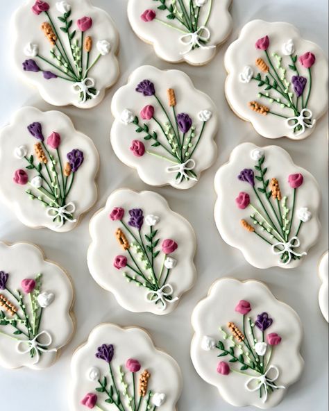 #decoratedcookies #sugarcookies #floral Floral Grad Cookies, Watercolor Floral Cookies, Flower Graduation Cookies, Floral Wedding Cookies Decorated, Wildflower Wedding Cookies, Spring Wedding Cookies, Wildflower Bridal Shower Cookies, Floral Sugar Cookies Decorated, Love In Bloom Cookies