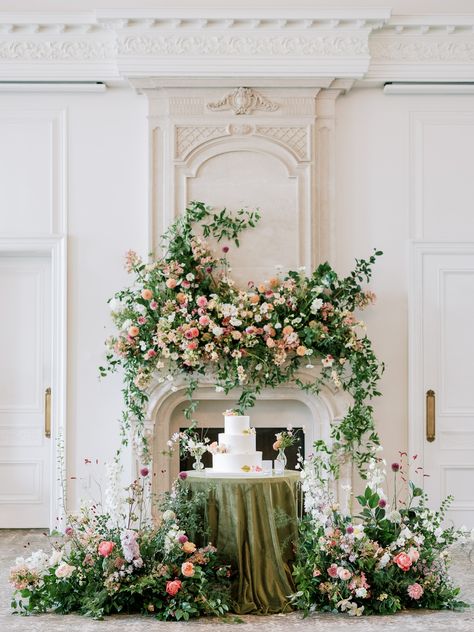 Wedding Cake Table Floral Arrangements, Elaborate Wedding Florals, Staircase Floral Installation, Indian Wedding Florals, Fireplace Wedding Flowers, Fireplace Floral Arrangements, Mantle Installation, Wedding Cake Backdrop Ideas, Wedding Cake Display Ideas