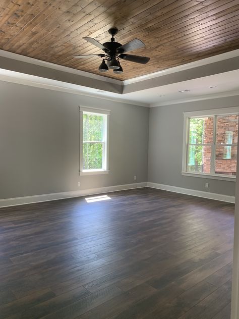 Wood Ceiling Ideas Bedroom Master Suite, Master Bedrooms Wood Ceiling, Natural Wood Tray Ceiling, Tray Lighting Ceiling, Wood Paneled Ceiling Bedroom, Wood Trey Ceiling Ideas Bedroom, Unique Bedroom Ceiling Ideas, Wood Ceiling Paint Colors, Farmhouse Crown Molding Ceilings Wood