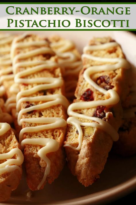 A plate of several pieces of cranberry orange pistachio biscotti, with orange glaze. Pecan Biscotti Recipe, Cranberry Biscotti Recipe, Pistachio Biscotti Recipe, Best Biscotti Recipe, Christmas Biscotti, Orange Biscotti, Orange Pistachio, Cranberry Biscotti, Cranberry Pistachio Biscotti