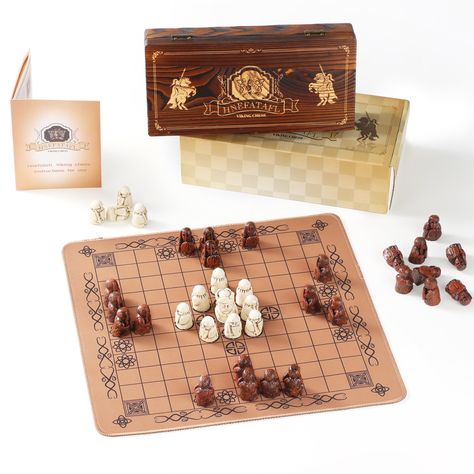 PRICES MAY VARY. VIKING GAME: This is a time-honored board game that was invented by the Vikings and spread around the world. Unlike most games you've played in the past, the 37 Hnefatafl pieces are not evenly distributed, as life and war are usually not fair. In the ancient game of Hnefatafl, you will find the answer and perhaps lead your army to victory. GAMEPLAY: in which two players pursue distinct goals: the defenders attempt to escort their king off the battlefield, while the attackers see Viking Chess, Vikings Game, Strategy Board Games, Set Game, Chess Game, Travel Board, Chess Pieces, Chess Set, Exercise For Kids