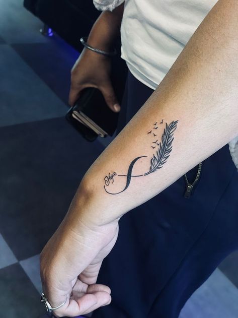 Daughters Names Tattoos, Tattoos For Daughters Name, Lost Love Tattoo, Mission Tattoo, Daughters Name Tattoo, Flower Neck Tattoo, Infinity Tattoo With Feather, Rare Tattoos, Names Tattoos For Men