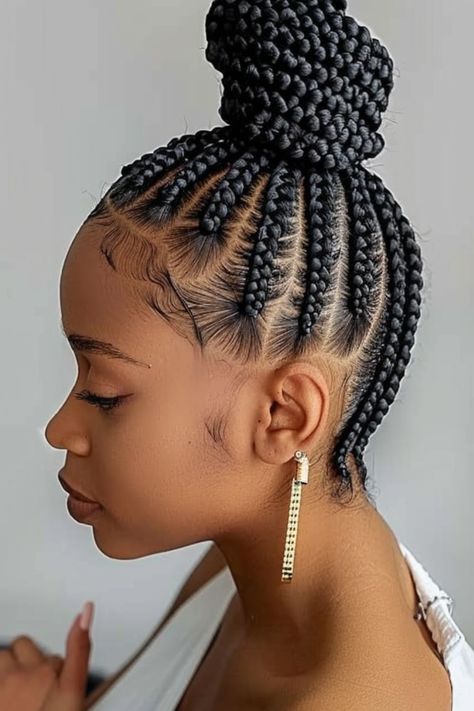 The perfect updo! This high bun with intricate cornrows is ideal for formal events or just adding a touch of elegance to your everyday style. Cornrow Updo Hairstyles Buns, Updo Cornrow Hairstyles, Cornrows Into A Bun, Intricate Cornrows, Updo Cornrows, Goddess Cornrows, Vacay Hair, Cornrows Ideas, Cornrow Updo Hairstyles