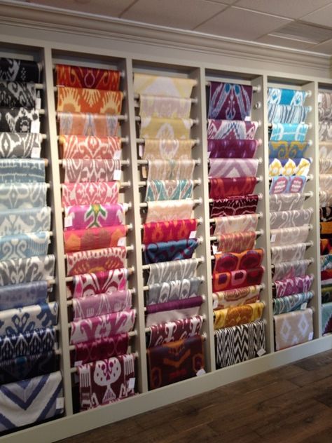 Is this a practical way to display scarves in stores? #visual #merchandising Fabric Shop Display, Gift Shop Interiors, Scarves Store, Fabric Store Displays, Fabric Store Design, Scarf Display, Clothing Store Interior, Clothing Store Design, Store Design Boutique