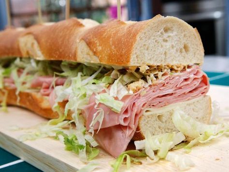 Get Jeff Mauro's Giant Mortadella Sub Recipe from Food Network Mortadella Sandwich, Submarine Sandwich, Jeff Mauro, The Kitchen Food Network, Sub Sandwich, French Fried Onions, Sub Sandwiches, Burgers Sandwiches, Football Food