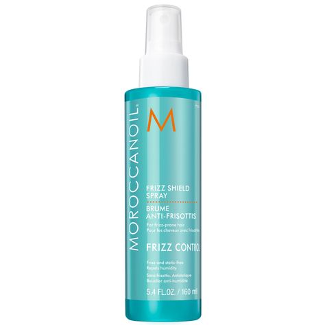 A heat-activated styling mist enriched with argan oil, the Moroccanoil Frizz Shield Spray encourages long-lasting smoothness. The lightweight formula sets to work to protect against unwanted flyaways and static caused by humidity. A must have addition to your beauty routine, the multi-purpose mist harnesses the nourishing properties of argan oil to help hydrate hair and deliver sleek, silky-soft results. | Moroccanoil Frizz Shield Spray, 5. 4 oz | Dermstore Hair Frizz Control, Hair Frizz, Hydrate Hair, Texturizing Spray, Hair Shine, Frizz Control, Amaranth, Frizz Free, Frizzy Hair