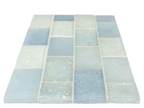 Fluid Subway Glass Tile C Blend 2x4 is handmade using a combination of upcycled frosted and glossy glass with a passion for design in tiles. The Fluid Glass Tile Collection is suitable for kitchen backsplash, bathroom, shower, floor, walls, swimming pools, and spas.This artesian glass mosaic tile is face-mounted on a 14''x 16" sheet for an easy installation. The slight surface variations are inherent to this product due to the handcrafted manufacturing process and add to the aesthetic value of t Sea Glass Tile, Glass Tile Backsplash Kitchen, Tile Walk In Shower, Beautiful Kitchen Cabinets, Recycled Tile, Glass Tile Backsplash, Glass Subway Tile, Beach Bathrooms, World One