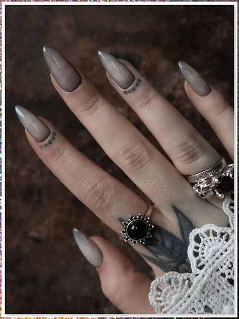 If you're looking for a way to add a little edge to your look, Goth stiletto nails are perfect! These nails are designed with a long, thin blade on one end and a pointy, black stiletto on the other. They are perfect for a Goth look and can be paired with a black dress or clothing to create the perfect look. Grey Gothic Nails, Vampire Ombre Nails, Vampire Nails Gothic Aesthetic, Gothic Inspired Nails, Nail Art Gothic Dark Beauty, Goth Ombre Nails, Grey Goth Nails, Gothic New Years Nails, Nails Inspiration Goth