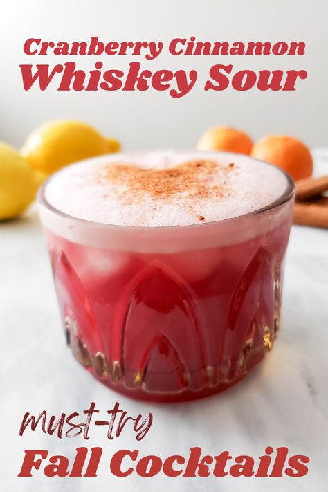 Get ready for fall with this simple delicious Cranberry Cinnamon Whiskey Sour that is both sweet and tart with a hint of vanilla and cinnamon spice. If you like Whiskey Sours, then you will love this fall whiskey cocktail. Fall Cocktails | Fall Drinks | Fall Party | Whiskey Drinks | Whiskey Cocktails Cranberry Cinnamon Whiskey Sour, Cranberry Whisky Sour, Thanksgiving Whiskey Cocktail, Creamy Fall Cocktails, Thanksgiving Whiskey Drinks, Fall Whiskey Sour, Whiskey Sour Recipe Easy, Whiskey Fall Cocktail, Gentleman Jack Drinks