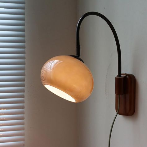 PRICES MAY VARY. ★ Mid century modern wall light fixture for bedroom, based on simple design, metal lamp arm, durable; with warm and atmospheric pleated cloth lampshade, the light is soft and not dazzling, and the texture is strong and noble.  ★ Material size: wrought iron, wood, glass shade, the lamp body hardware is treated with multiple paints. High temperature paint is uniform in color, corrosion resistance, colorfast and easy to care for. Diameter 18cm, height 34cm, Wall diameter 18cm. ★ E2 Wood Wall Light, Bedside Wall Lamps, Wood Lamp Shade, Plug In Wall Lights, Reading Wall, Metal Lamp Shade, Wall Lamps Bedroom, Glass Wall Lights, Mid Century Modern Walls