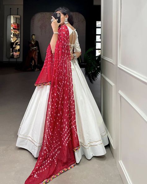 Rate : 1600 #apex__outfit Give yourself quintessential look in navratri by wearing this classic lehenga choli crafted from the finest cotton, adorned with gamthi work blouse ✨ Lehenga(Stitched) : Lehenga Fabric : Pure Cotton Lehenga Work : Plain With Gotta Patti Touch Up Lehenga Waist : Support Up To 42 Lehenga Closer : Drawstring With Heavy Tassels Stitching : Stitched With Canvas And Full Inner Length : 42 Flair : 4 Meter Inner : Micro Cotton Blouse(Stitched) : Blouse Fabric : Pure Cot... Classic Lehenga, Cotton Lehenga Choli, Gamthi Work, Cotton Lehenga, Stitched Lehenga, Gotta Patti, Chaniya Choli, Lehenga Choli, Touch Up