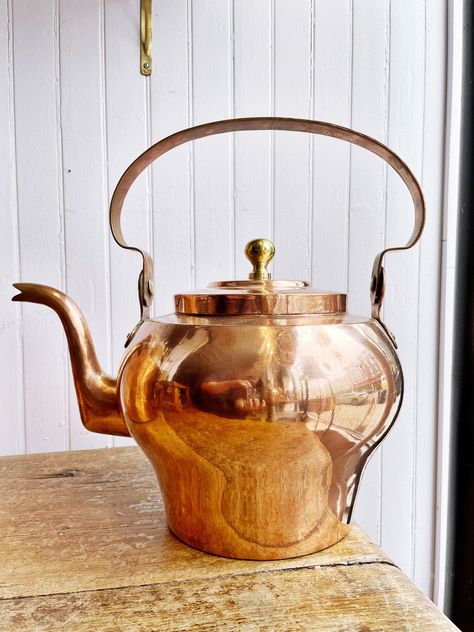 A big & beautiful antique mid to late 1800s copper tea kettle, made in France and marked to hold 7 liters so it was probably used in a hotel or chateau setting. Hand-formed with beautiful dovetail or cramp seam construction, this piece is in excellent condition for its age with small marks a bumps but no dents or damage. Measures approximately 10" long from spout to handle by 15" tall to the top of the handle. Royal Kitchen, Silver Plated Tea Set, Copper Tea Kettle, Antique Tiffany, Copper Cookware, Hudson Ny, Copper Pots, Tea Makers, Kitchen Witch