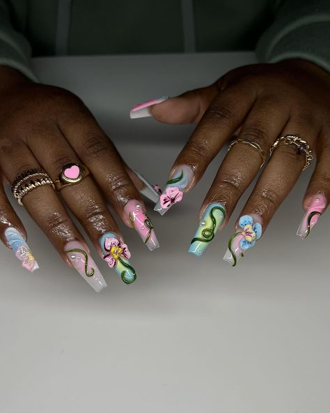 the perfect spring nails 🌸🌱🦋🌼 inspo: @setsxnenita @shopagaloreco products used: *bonding base *ultra white, ballet slipper, wild strawberry, wine, carolina, periwinkle, cobalt, razzle dazzle, crocodile, indica, limon *bling gel *diamond steel top coat use code ‘ALEXIA10’ at checkout 🤎 #nailart #naildesign #flowernails #floralnailart #3dnails #3dnailart #cltnails #cltnailtech #gelx #gelxnails #gelxinspo #gelxnailtech #pastelnails #springnails Strawberry Acrylic Nails, Bday Nails, Strawberry Wine, Wild Strawberry, Aesthetic Nails, Floral Nail Art, Ultra White, Long Acrylic Nails Coffin, Paws And Claws