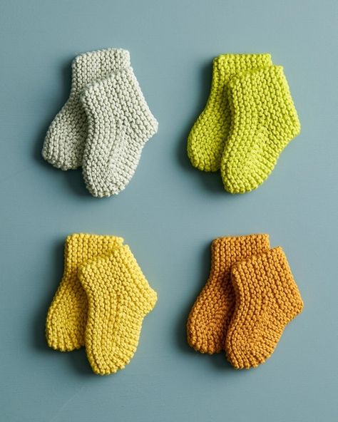 Happy Feet Booties - Purl Soho | Beautiful Yarn For Beautiful KnittingPurl Soho | Beautiful Yarn For Beautiful Knitting Knit Baby Booties Pattern Free, Baby Socks Knitting Pattern, Baby Booties Free Pattern, Baby Bootie, Baby Booties Knitting Pattern, Knitted Mittens, Knitting Dolls Clothes, Baby Booties Pattern, Creative Knitting