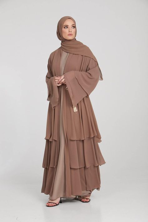 Fabric - Chiffon Hijab is included Fabric Belt is included Gold Slim Plaited Belt is used for styling purpose only and can be purchased separately. Pop up buttons allows you to wear the abaya open or closed Model is wearing our 'Latte Inner Slip Dress' in a size 56 Model is UK size 8, height of 5'6 and wearing a size 58 Hand Wash Only Burqa Design, Front Open Abaya, Burqa Designs, New Style Dress, Abaya Designs Latest, Dress Abaya, Muslim Style, Open Abaya, Muslim Fashion Hijab Outfits