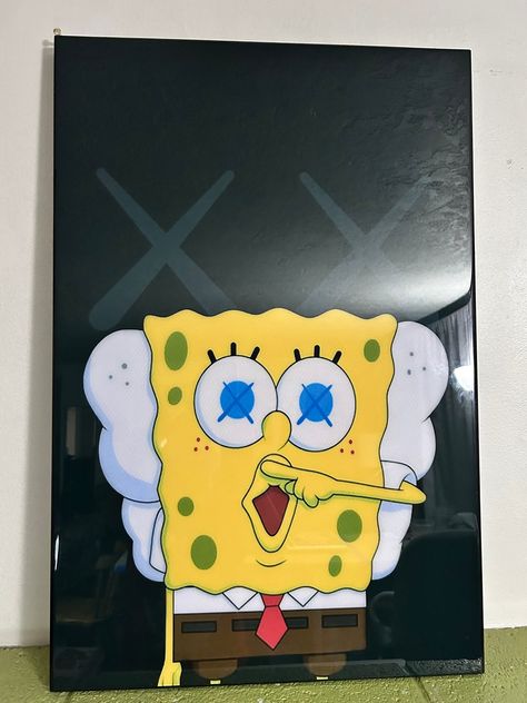 This unique and handmade Resin Epoxy Wall Art features the iconic character Bod Esponja Kaws in a fantasy style print. The piece measures 20 inches in length by 30 inches in height and is framed with a width of 1.5 inches. The material used for this print is ink and it comes as a single piece unit of sale.  This art print is perfect for fans of Hiperbeast and Hypebeast artists, as well as those who appreciate handmade pieces. It does not come with a Certificate of Authenticity (COA) but it can be personalized upon request. The production technique used for this piece is manual, making it a one-of-a-kind addition to any art collection. Canvas Sharpie Art, Epoxy Wall Art, Kaws Painting, Bob Sponge, Epoxy Wall, Y2k Room, Cartoon Art Drawing, Art Deco Paintings, Artsy Aesthetic