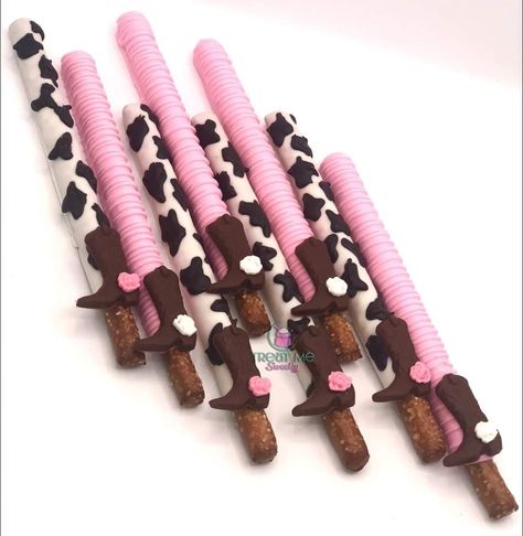 Rodeo Pretzel Rods, Cow Print Gender Reveal Decorations, Cow Desert Ideas, Cowgirl Theme Cupcakes, Cow Print Treat Table, Cow Print Rice Krispies, Cow Pretzel Rods, Rodeo Treat Table, Cow Print Dessert Table