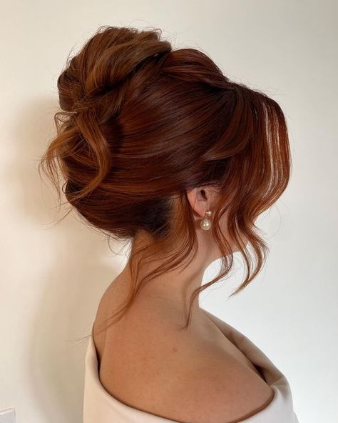 RACHEL JONES | Calgary Bridal Hair & Educator on Instagram: "Current Obsession : High Twist   And my hidden secret..  ✨ Hair Padding ✨  This is not a typical updo where you would “need” hair padding for volume  But I LOVE it for…  Longevity 🫶🏻  This is a very important word in the RJStyles Vocabulary because   Not only do I want you to look amazing when you leave the studio BUT for the next 10+ hours   The padding keeps the volume intact where teasing may not   Which not only provides height but width in your updo 🙌🏻  Ear rings: @joannabisleydesigns  Model/ hair color: @manesbymariah   #hightwist #updohairstyles #updotutorial #updospecialist #yycbride #yychair #schwarzkopf #schwarzkopfusa #calgarybusiness #calgarybride #albertabride #albertawedding  #2024hairtrends #2024bride   #btcone Soft High Bun Wedding Updo, Romantic Updo Medium Hair, Bridal Updo Red Hair, Copper Hair Updo, Piled High Updo, Bridal Hair High Updo, Bridal Updo With Bangs, High Messy Updo, High Up Do