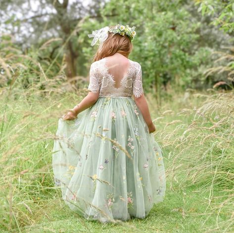 'Enchanted Dress - Fern Green /White Lace' These are so stunning, a truly beautiful girl's occasion dress. Our enchanting lace and tulle with our newest patterned lace is a perfect flower girl dress. It is made with a delicate floral patterned off-white coloured lace bodice, with a matching embroidered fern /sage green tulle skirt. The V-shaped back with unfinished lace adds the perfect vintage charm to this dress. The lace bodice is baby-soft and has a slight stretch. While our dresses are wide Flower Girl Dress For Kids, Sage Green Bridesmaid Dresses For Kids, Light Green Flower Girl Dresses, Fairy Flower Girl Dress, Olive Green Flower Girl Dress, Flower Girl Dresses Sage Green, Flower Girl Sage Green, Green Floral Bridesmaid Dresses, Flower Girl Dresses Green