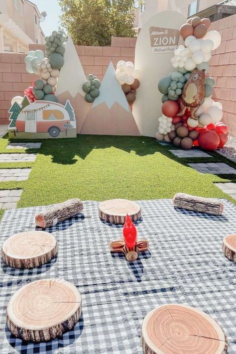 Airstream Birthday Party, Camping Birthday Decoration Ideas, Birthday Party Camping Ideas, Camp Birthday Backdrop, Adventure Party Decorations, S’mores 1st Birthday, Camp Themed 1st Birthday Party, Second Birthday Camping Theme, Nordic Birthday Party