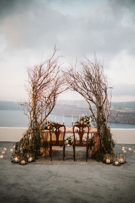 elopement dinner settings, wedding arch, wedding flowers Fairy Lights Centerpieces, Tree Branch Arch, Tree Branch Wedding Arch, Lights Centerpieces, Branch Arch Wedding, Elopement Dinner, Branches Wedding, Colourful Flowers, Dinner Decoration