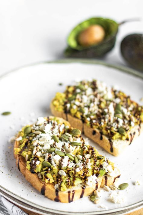 Avocado Toast with Feta Cheese and Balsamic Glaze Avocado Toast With Feta, Recipe With Feta Cheese, Loaded Avocado, Balsamic Drizzle, Avocado Recipes Breakfast, Feta Cheese Recipes, Lunch Inspiration, Avocado Toast Recipe, Feta Recipes