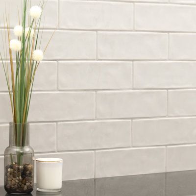 The Urbano Collection makes a style statement in a palette of cool and calming muted hues, like subtle creams, grays, and concrete looks all the way to a striking black. These 4x12 glossy wall tiles have an authentic hand-crafted look and feel that give your kitchen, bath, living room, or other interior space a touch of contemporary detail. Whether installed horizontally, vertically, or in a herringbone pattern for a touch of the unexpected this backsplash tile gives your walls, backsplash, show Long Subway Tile Backsplash, Beige Subway Tile Backsplash, Large Subway Tile Backsplash, Glossier Dusk, Incredible Kitchens, Textured Subway Tile, Textured Subway, Beveled Subway Tile, Fireplace Facade