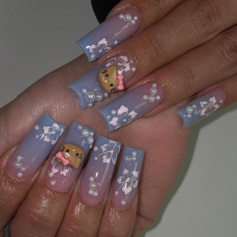 hello kitty hawaii nails 🌺💞✨ . hk charms + tapered nails tips @nailsbylili.shop . #almondnails #squarenails #nailinspo #hellokittynails #valentinobeautypure #frenchtipnails #whitenails #ombrenails #airbrushnails #glitternails #pinknails #chromenails #goldnails #lanails #lanailtech #hawaiinails Hawaiian Hello Kitty Nails, Tapered Nails, Pool Nails, Sanrio Nails, Hawaii Nails, La Nails, Airbrush Nails, Aesthetic Nails, Hello Kit