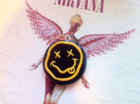 Hey, I found this really awesome Etsy listing at https://www.etsy.com/listing/269156362/grunge-band-polymer-clay-smiley-charm Grunge Clay Ideas, Nirvana Art, Band Artwork, Nirvana Logo, Music Crafts, Grunge Band, Clay Crafts Air Dry, Alternative Metal, Logo Art