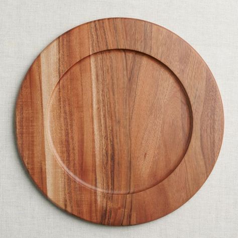 Gorgeously grained acacia wood charger underpins place settings with the warm look of natural wood in a clean, rimmed shape. Perfect for chic dinner parties and family feasts, our Carson charger dresses up any meal when placed under a dinner plate. Cut from seasoned acacia wood, each charger is turned to create its clean, rimmed shape. Pair with any of our Carson acacia serving pieces for a unified, modern organic table.   View all Carson Serveware      Acacia wood  Wipe clean with damp cloth  M Buffet Plates, Table Chargers, Wood Chargers, Organic Table, Wood Plates, Fancy Table, Wood Plate, Los Angeles Chargers, Sheesham Wood