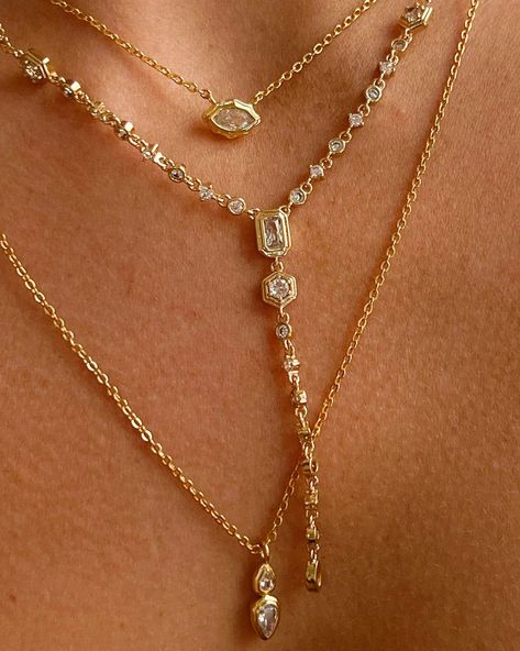 Lariat necklace with bezel-set CZ stone details Necklace is 14" long with a 2" extender Lariat drop is 3" CZ Stones Plated Gold Also available in Silver Lobster clasp Necklace is 100% nickel-free and cadmium-free Gold Jewellery Aesthetic, Jewellery Stack, Lariat Necklace Gold, Long Necklace Gold, Long Gold Necklace, Dope Jewelry Accessories, Lariat Style Necklace, Gold Drop Necklace, Gold Lariat Necklace