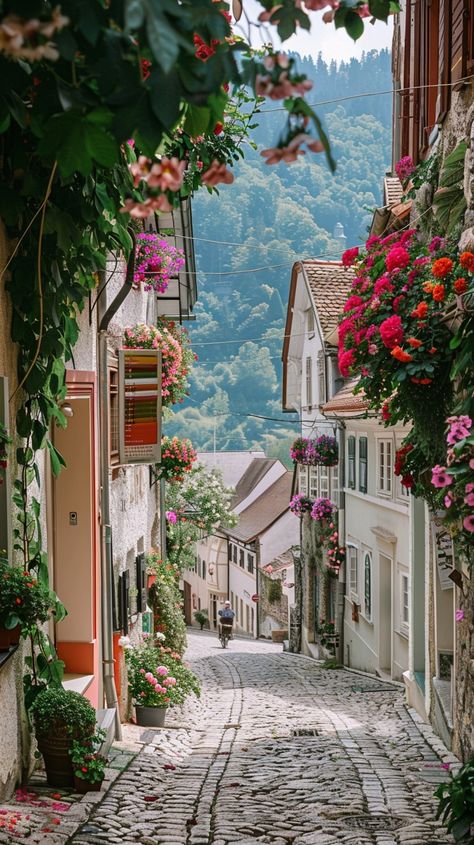 Charming Cobblestone Street: A charming #cobblestone street lined with #floweringplants in a quaint #village surrounded by lush green #hills. #tranquil #picturesque #aiart #aiphoto #stockcake ⬇️ Download and 📝 Prompt 👉 https://stockcake.com/i/charming-cobblestone-street_1151281_836915 Street View Aesthetic, Cute Town, Cobblestone Street, Shop Painting, Property Ideas, Street Image, Cobbled Streets, Antique Wall Decor, Stone Street