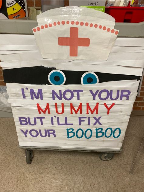 Nurse Halloween Door Decorations, Halloween School Nurse Door Decorations, Nursing Halloween Decor, Halloween Nurses Station Decor, Halloween Door Decorations Nursing Home, Nurses Station Halloween Decor, School Nurse Halloween Door, Fall School Nurse Bulletin Board Ideas, Medical Office Halloween Decorations