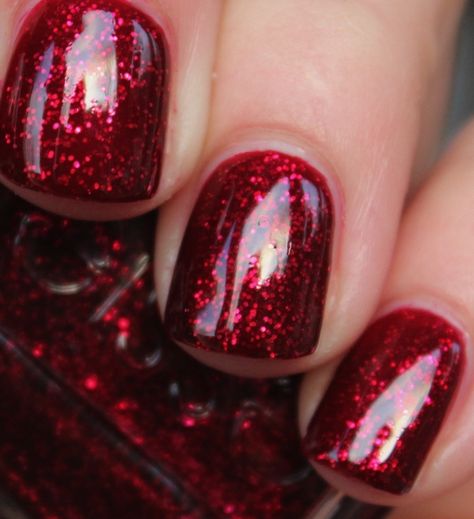 Perfect dark sparkly red - so festive. via purrrpolish ~: Essie - Leading Lady Need this for Christmas! Red Glitter Toe Nails, Opi Red Glitter Nail Polish, Sparkly Red Nails Christmas, Deep Red Sparkle Nails, Deep Red Glitter Nails, Essie Christmas Nails, Opi Christmas Nails, Red And White Sparkle Nails, Christmas Red Glitter Nails