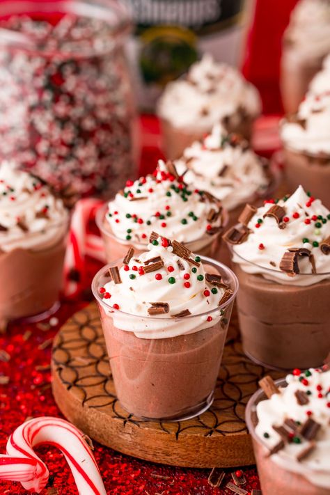 Peppermint Mocha Pudding Shots is a creamy, seasonal dessert that's made with only 6 ingredients and perfect for those adult holiday parties! Prep about two dozen shots in just 5 to 10 minutes! Peppermint Chocolate Pudding Shots, Peppermint Schnapps Pudding Shots, Christmas Cocktail Party Desserts, Hot Cocoa Shots, Christmas Cookie Pudding Shots, Christmas Shots Jello, Christmas Dessert Shots, Holiday Pudding Desserts, Christmas Themed Jello Shots