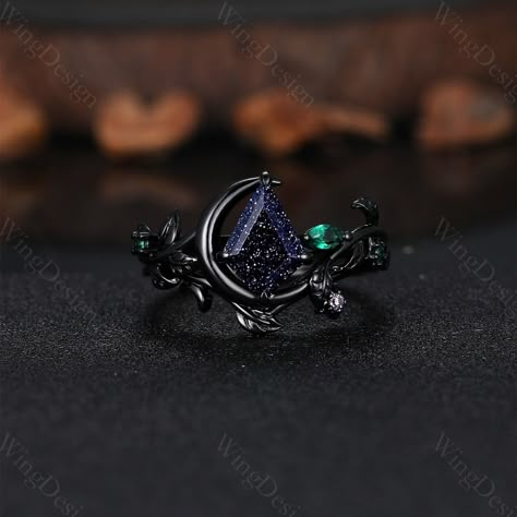 Nature inspired blue sandstone engagement ring set unique moon style emerald cluster ring gothic black gold rings for women leaf branch rings -----Ring Information----- ✦Engagement Ring Metal Type: 925 sterling silver, 10K/14K/18K Solid Gold, Platinum Center stone: Blue sandstone Stone size: 7x10mm kite cut Side stone: emerald ✦Wedding Band Stone: Round amethyst  ✦ Please feel free to contact me if you have any questions or you are interested in custom order. ✦Black rhodium plating: Rhodium, a v Moon Engagement Ring Silver, Sapphire And Garnet Ring, Intricate Ring Designs, Bismuth Engagement Ring, Acotar Inspired Rings, Blue Sandstone Engagement Ring Silver, Gothic Engagement Ring Silver, Engagement Rings Gothic, Witch Wedding Ring