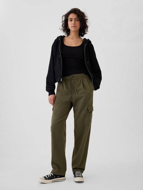 Supersoft cotton-Tencel™ blend pull-on pants.  Elasticized waist with drawcords.  Front slant pockets.  Side cargo pockets.  Tapered leg.  * Fit: Slim.  A semi-fitted silhouette that fits close to the body at the waist and hip, with a slight ease through the thigh.  Tapered leg.  Model is approx.  5’10” wearing Olive Cargo Pants Outfit, Cargo Pants Outfit Fall, Leg Model, Olive Green Pants, Sassy Outfit, Cargo Pants Outfit, Curve Jeans, Denim Coat Jacket, Loungewear Shorts