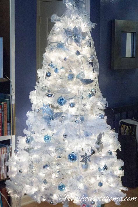 I love these elegant and glam Christmas tree ideas. With trees decorated in blue, white, pink, gold, silver, red and even black, there's all kinds of unique Christmas tree decorating ideas. #fromhousetohome #christmasdecor #christmas #christmastree  #diychristmas Glamorous Christmas Tree, Deco Violet, Christmas Tree Colour Scheme, White Xmas Tree, Blue Christmas Tree Decorations, Glam Christmas Tree, Elegant Christmas Tree Decorations, White Christmas Tree Decorations, Purple Christmas Tree