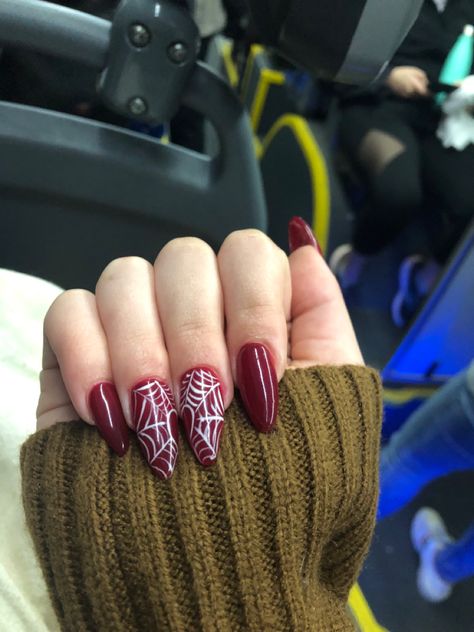 Dark Red Nails With Spider Web, Subtle Spiderman Nails, Red Nails With Spiderweb, Red Spider Web Nails, Red Spiderweb Nails, Red Spider Nails, Spider Gwen Nails, Red Acrylic Nails Almond, Spiderman Nail Art