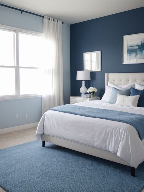 Create a stylish bedroom with a captivating blue accent wall. Enhance the look with a sleek white bed frame, vibrant throw pillows, and a textured rug for a modern and inviting space. Blue Accent Wall, Wall Color Combination, Decor Ideas For Living Room, Textured Rug, Home Decor Cozy, Bedroom Color Combination, Living Room Wall Color, Blue Accent Walls, Room Wall Colors