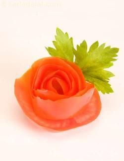 A perfectly suitable garnish for salads, subzis and varieties of rice! tarladalal.com Vegetable Garnish, Tomato Rose, Salad Decoration Ideas, Salad Decoration, Vegetable Art, Cake Slicer, Food Decorations, Decorações Com Comidas, Fruit And Vegetable Carving