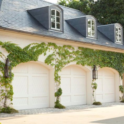 Garage Lights Exterior, Cement Driveway, Motor Court, Garage Door Types, Overhead Garage Door, Overhead Garage, Wood Garage Doors, Garage Door Makeover, Trendy Plants