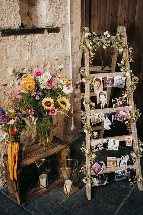 Photo Wall Ladder Decor Pagoda Wedding Ceremony Holly Collings Photography #wedding #weddingdecor Church Decorations Ideas Wedding, Photo Wall Wedding Ideas, Flowers Ceremony Wedding, Wedding Pagoda Decoration, Memorial Ideas Wedding, Memorial Ladder Wedding, Diy Wedding Photo Wall, Memory Ladder Wedding, Simple Aisle Decorations Wedding