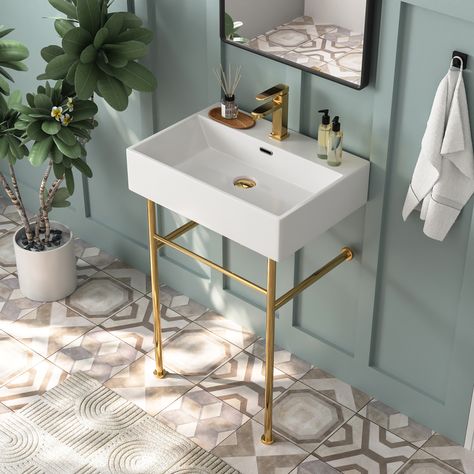 Crafted from premium ceramic, this console sink boasts exceptional scratch and stain resistance. Its spacious design allows for use by almost two people simultaneously, making it perfect for busy households. The open design adds a sense of space and openness to your bathroom. With 3 elegant color options to match your decor, the stainless steel console legs offer classic styling and convenient integrated front and side bars for towel storage. With an overflow, ergonomic design, and the perfect h Sink Legs, Bathroom Console, Console Bathroom Sink, Bathroom Sink Design, Bathroom Sink Tops, Console Sink, Console Sinks, Sink Design, Towel Storage