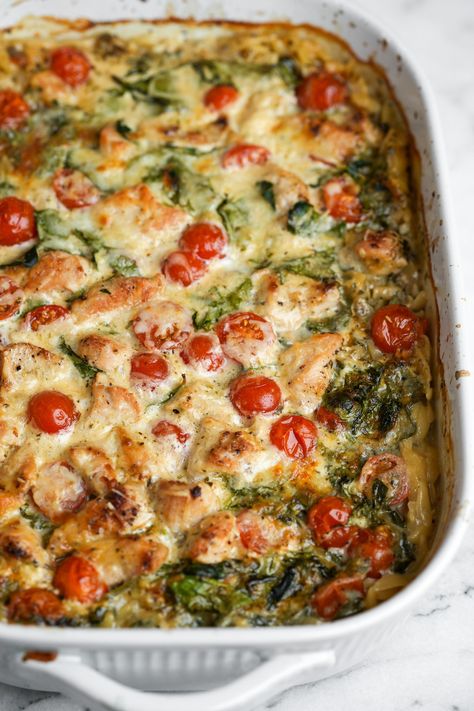 One-pan meal lovers unite, this orzo tuscan chicken bake is an easy dump-and-bake recipe that takes just 5 minutes to throw together. One Pan Tuscan Orzo With Chicken, Easy Chicken Recipes One Pan, Easy Healthy Orzo Recipes, Tucson Chicken Orzo, Dump Tuscan Chicken, Crockpot Weeknight Meals, One Pan Chicken Orzo Bake, Tuscan Orzo Dump And Bake, Orzo Tuscan Chicken