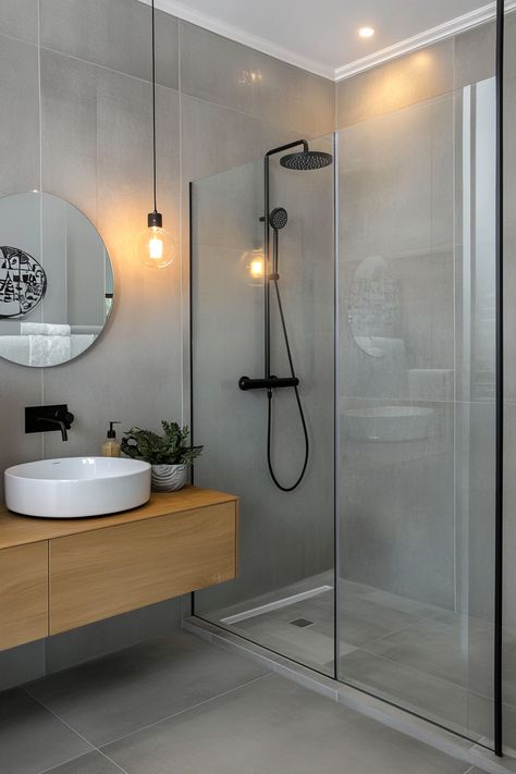 Transform your space with these sleek modern bathroom ideas. Featuring clean lines, a walk-in shower, and elegant lighting, this design maximizes both style and functionality. #ModernBathroomIdeas #HomeDesign #BathroomInspo Unisex Bathroom Ideas, Walk In Shower Small Bathroom, Modern Apartment Bathroom, Bathroom Tub Shower Combo, Best Bathroom Paint Colors, Bathroom Lighting Ideas, Toilet And Bathroom Design, Modern Bathroom Ideas, Toilet Room Decor