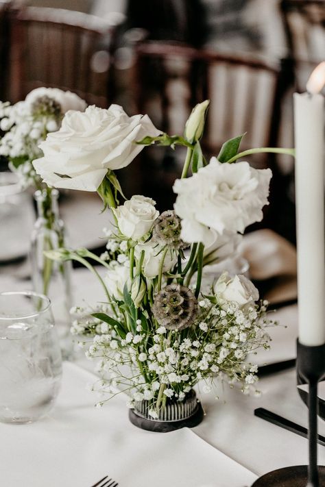 Ikebana floral arrangement with baby's breath, white roses, white spray roses, white lisianthus, and scabiosa pods are arranged in modern style on elegant tablescape. Frog Arrangement, Ikebana Arrangement, Floral Frog, Scabiosa Pods, Beauty Of Flowers, Ikebana Arrangements, Floral Design Studio, Spokane Washington, Event Floral Design