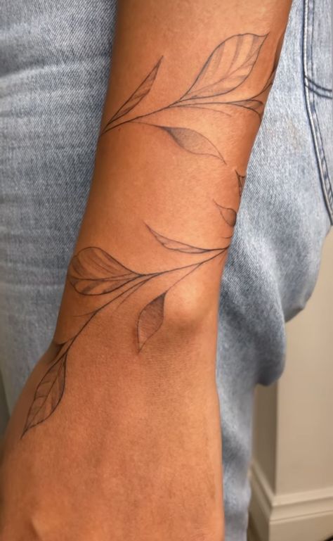 Fine Line Leaf Tattoo Arm, White Vine Tattoo, Vine Wrist Wrap Tattoos For Women, Vine With Words Tattoo, Wrist Leaves Tattoo, Leave Arm Tattoo, Wrap Forearm Tattoo Women, Leaf Tattoo Around Arm, Vine Tattoo On Forearm