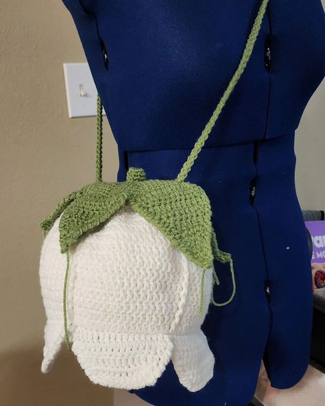 Sneak peek 👀 my new pattern Lily of The Valley crossbody bag. This is just the prototype. Making the necessary adjustments and then I'll be calling for a tester call ☺️☺️ #crochetersoftheworld #crochetersofinstagram #crochetdesign #crochet #crocheted #crochetbag #crochetdesign #crochetdesigner #crochetstitches #bag #flower Crochet Apple Bag, Lily Of The Valley Crochet, Crochet Lily, Lily Bag, Crochet Apple, Crochet Bouquet, Bag Flower, Crochet Bags, Fiber Arts