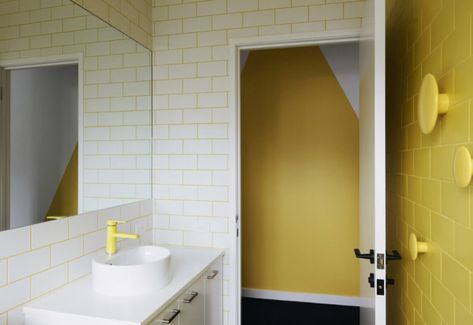 neon yellow grout, fixtures and an accent tile wall with wall hooks, all in yellow Bright Color Bathroom, Yellow Grout, Coloured Grout, Small Bathroom Sinks, Bad Set, Balkon Design, Aesthetic Bathroom, Bathroom Red, Red Brick House